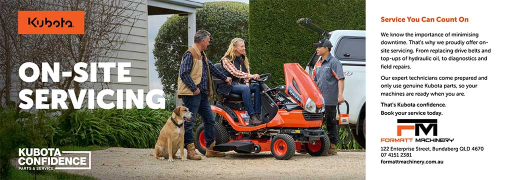 Kubota on-site servicing technician inspecting ride-on mower at customer property Bundaberg QLD